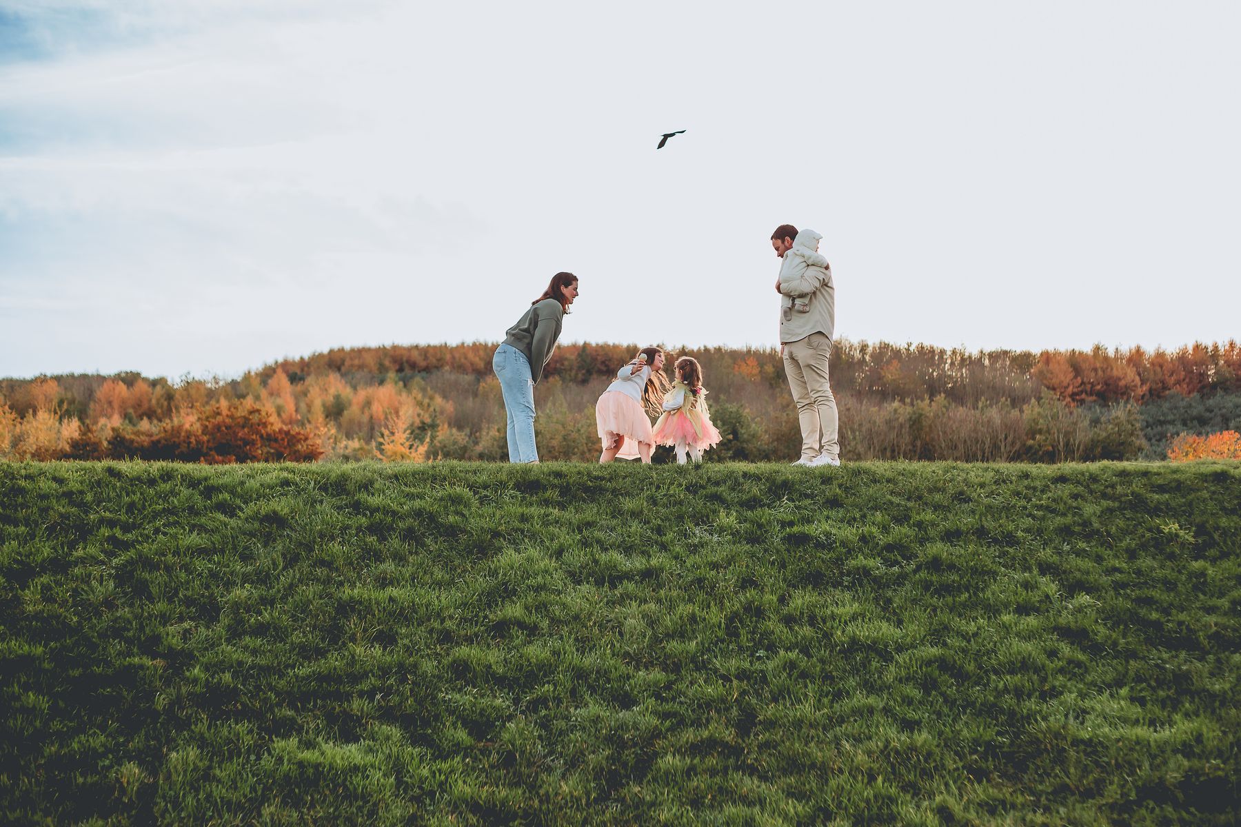 Family in a golden autumn field, Cheshire